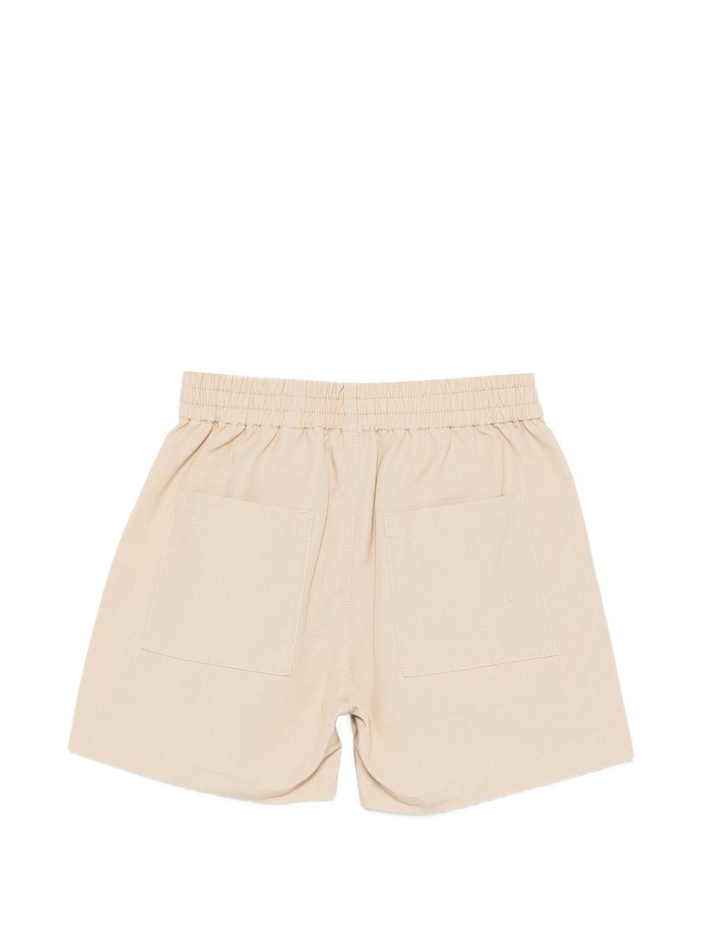 Shorts per neonati Moschino Kids beige con logo sul davanti MUQ01NLLA14 20829 MOSCHINO KIDS 