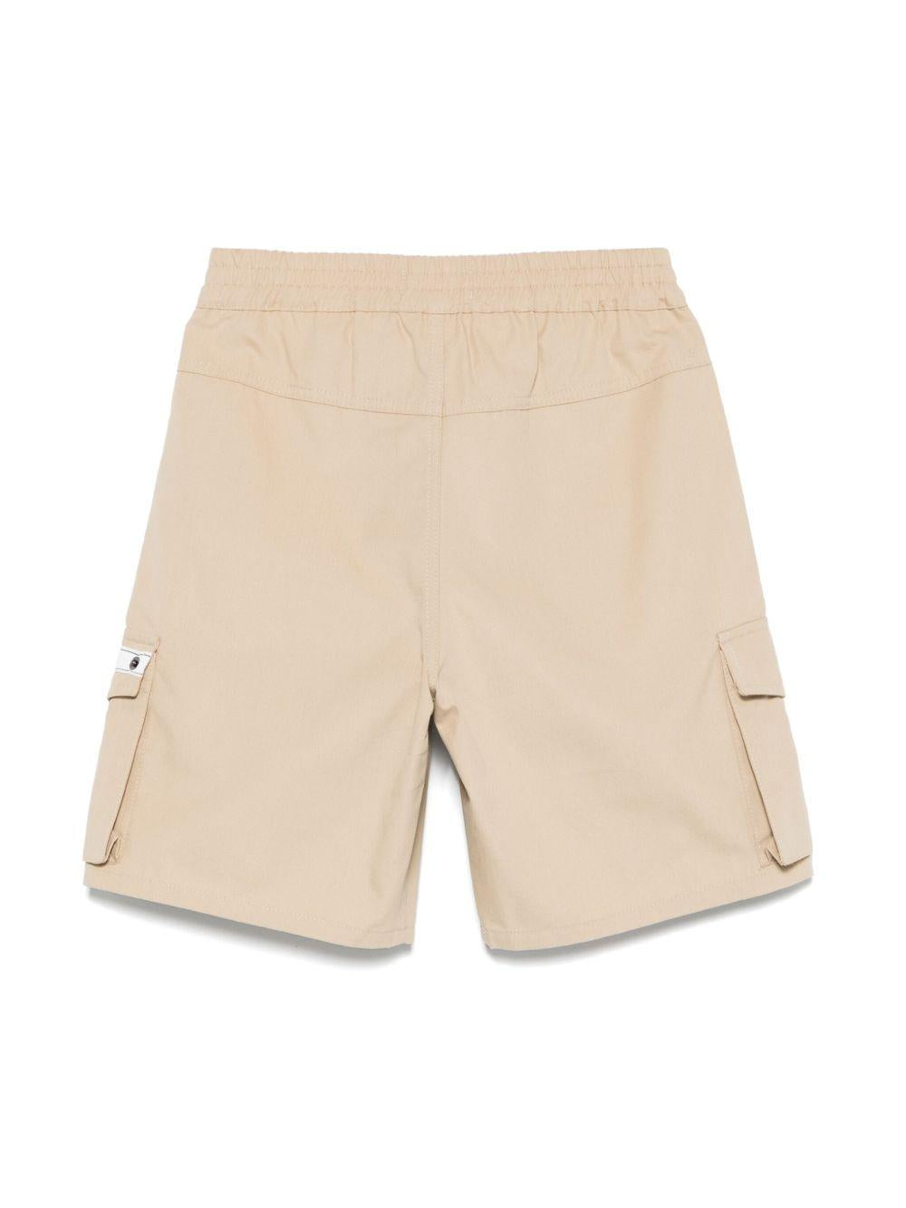Cargo corti per neonato Moschino Kids beige con applicazione MUQ01EN0Z97 20366 MOSCHINO KIDS 