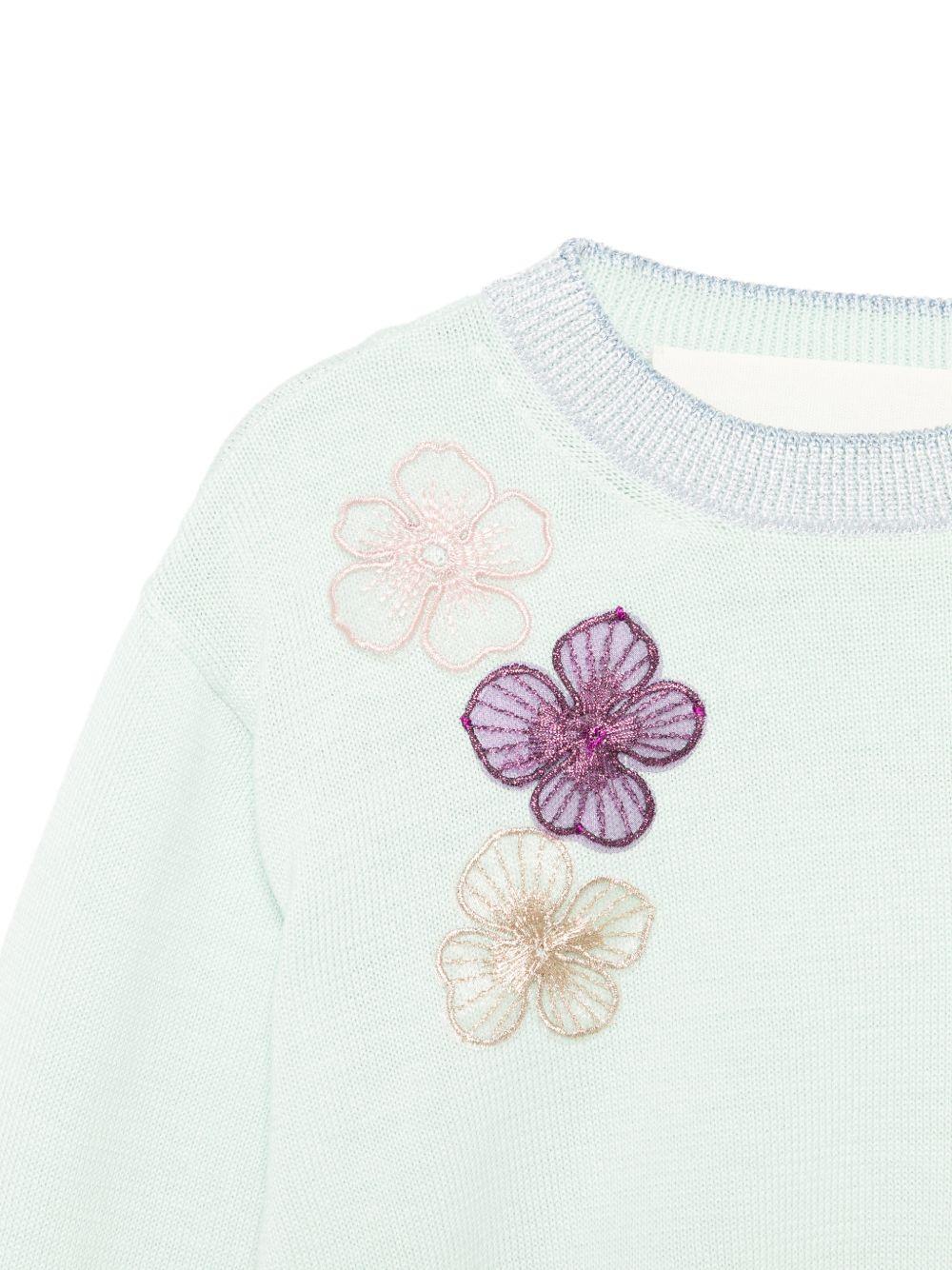 Maglione per bambina Simonetta azzurro con applicazioni floreali SY9A20 X0018 700 SIMONETTA KIDS 