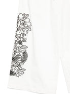 Pantaloni per bambina John Richmond bianchi con stampa floreale RGP26127PA WHITE JOHN RICHMOND KIDS 