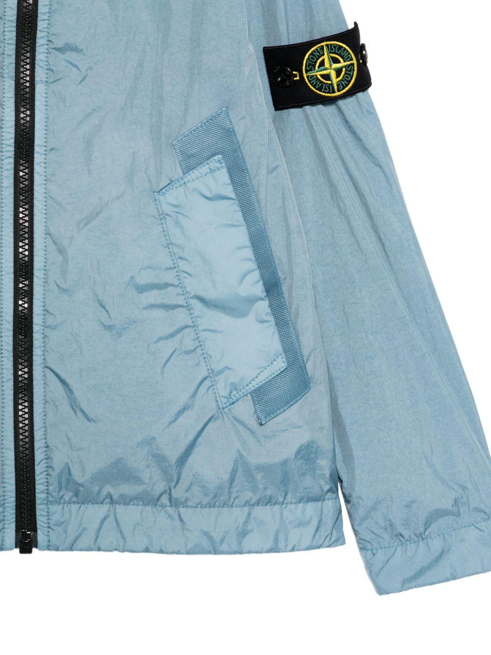 Giacca per bambino Stone Island Junior azzurro con cappuccio L1S164100003S0A23 V004A STONE ISLAND KIDS 