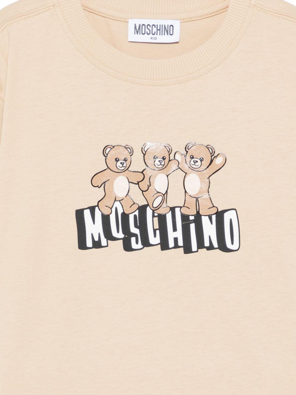 T-shirt per bambini Moschino Kids beige con stampa tre Teddy Bear HUM05PLAA23 20829 MOSCHINO KIDS 