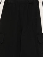 Pantaloni sportivi per bambina Palm Angels Kids neri con decorazioni sui lati PGCJ011S26FLE001 110 PALM ANGELS KIDS 