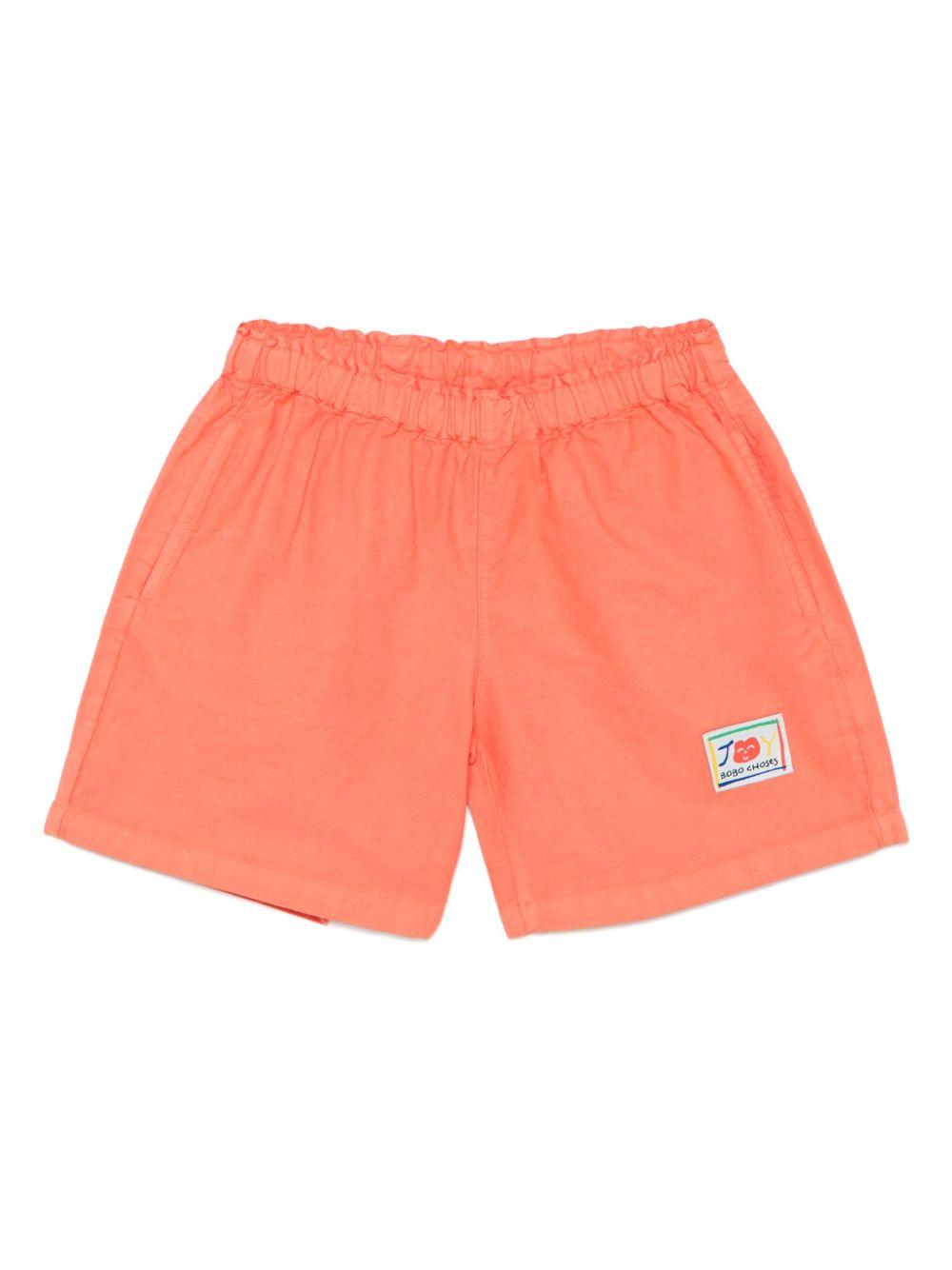 Shorts per bambino Bobo Choses Similing arancione con logo applicato B125AC059 611 BOBO CHOSES 