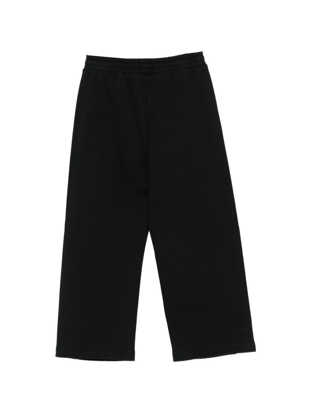 Pantalone per bambino Palm Angels Kids nero con dettaglio logo PBCH012S26FLE001 110 PALM ANGELS KIDS 