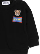 Felpa per neonati Moschino Kids nera con dettagli in rilievo M9F03QLCA19 60100 MOSCHINO KIDS 