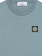 T-shirt per bambino Stone Island Kids azzurro con logo sul davanti L2S162100003S0047 V004B STONE ISLAND KIDS 
