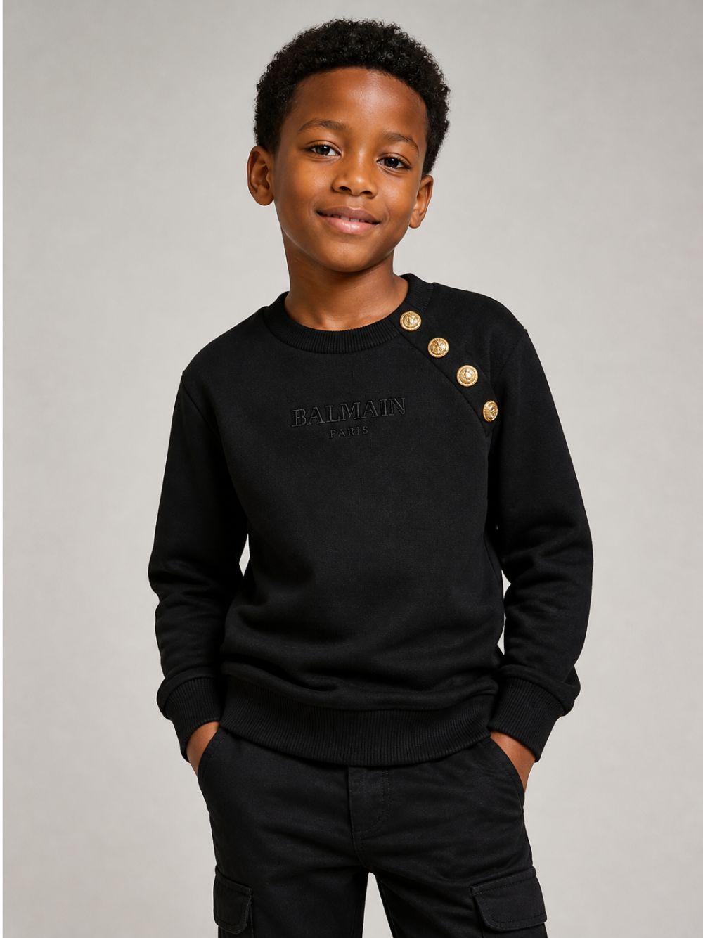 Felpa per bambino Balmain Kids nero con dettaglio con bottoni oro BZ4I10 Z3183 930OR BALMAIN KIDS 
