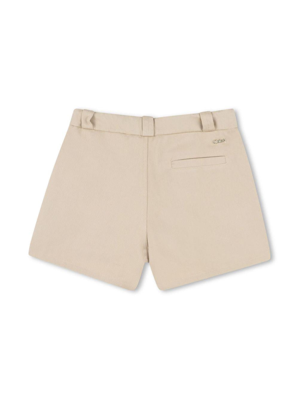 Shorts per bambina Chloé Kids beige con tasche frontali con zip C20467 281 CHLOE' KIDS 