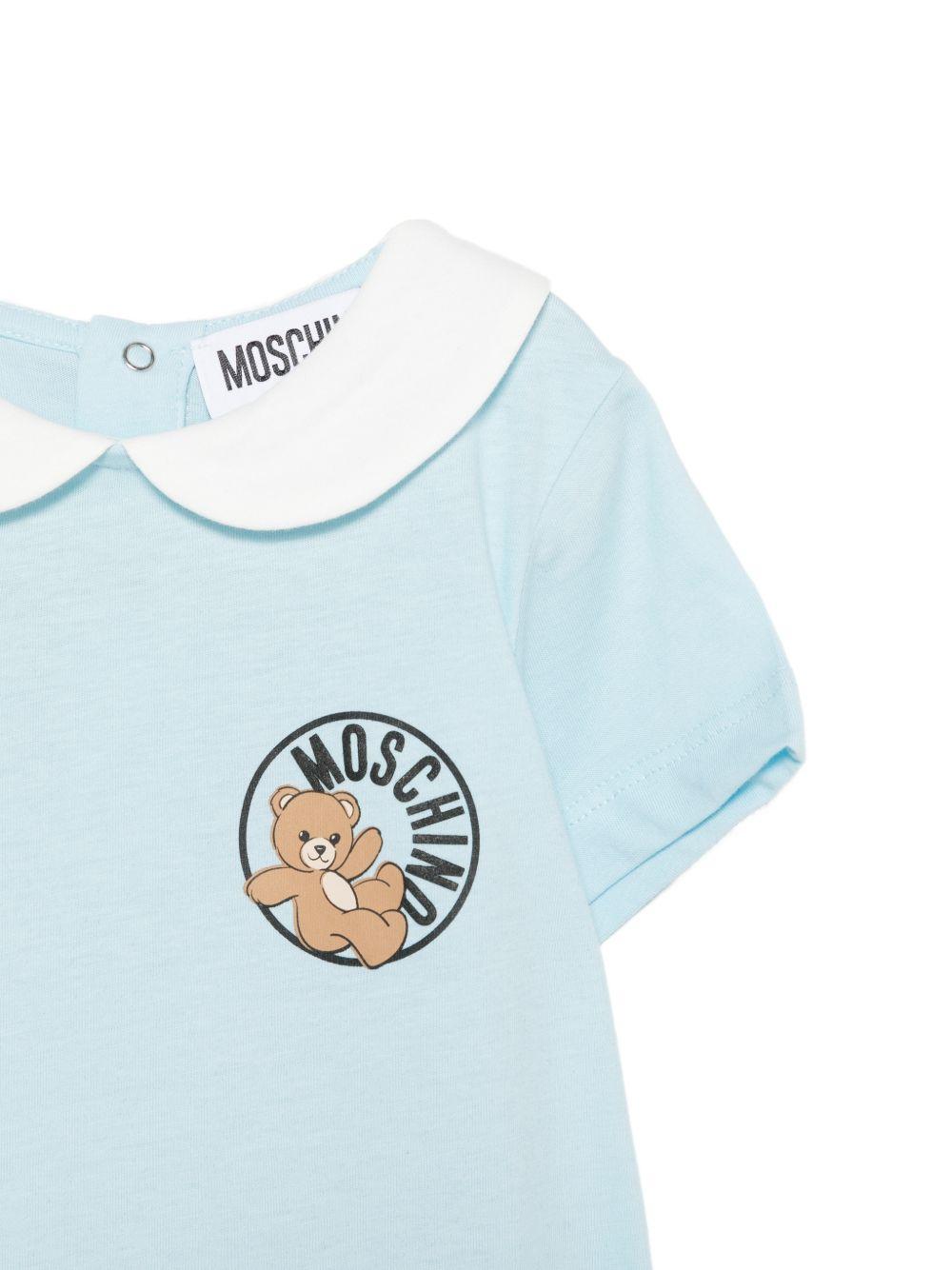 Tutina per neonato Moschino Kids azzurra con stampa logo MMY03YLAA03 40304 MOSCHINO KIDS 