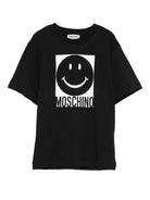T-shirt per bambino Moschino Kids nero con stampa smiley HSM05GLAA01 60100 MOSCHINO KIDS 