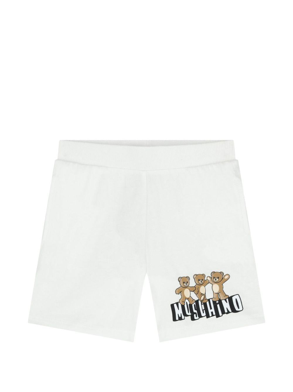 Shorts per neonato Moschino Kids bianchi con tre Teddy Bear MUQ01ULAA17 10101 MOSCHINO KIDS 
