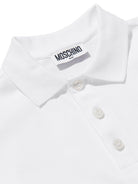 Polo da bambino Moschino Kids bianca con stampa orsacchiotto HSM03YLFA09 10101 MOSCHINO KIDS 
