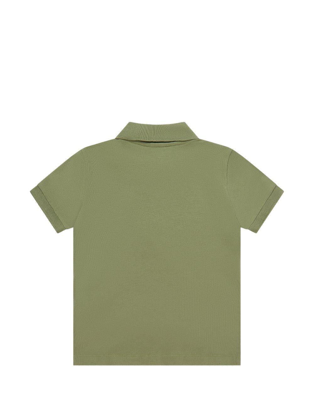 Polo da bambino Moschino Kids verde con stampa orsacchiotto HSM03YLFA09 30037 MOSCHINO KIDS 