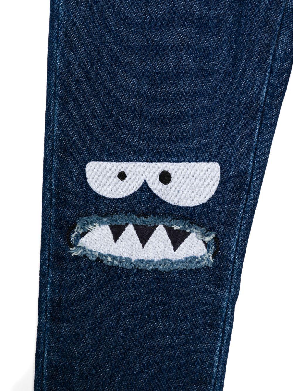 Jeans per bambino Stella McCartney Kids in denim con ricamo sul ginocchio TX6Q00 Z0746 620 STELLA McCARTNEY KIDS 