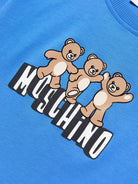 T-shirt per bambini Moschino Kids blu con stampa grafica orsetti HUM05PLAA23 40630 MOSCHINO KIDS 