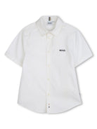 Camicia a maniche corte per bambino BOSS Kidswear bianco con logo sul petto J52273 10P BOSS KIDS 