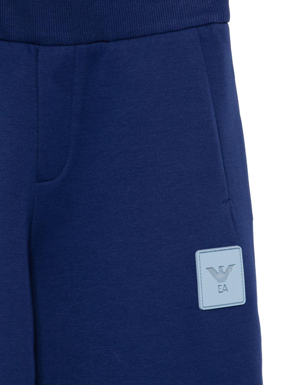 Pantaloni per bambino Emporio Armani Kids blu con logo sul davanti EB001021 AF10126 UB105 EMPORIO ARMANI KIDS 