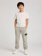 Pantaloni sportivi per bambino Stone Island Kids grigio con logo L2S166200002S0A20 V0068 STONE ISLAND KIDS 