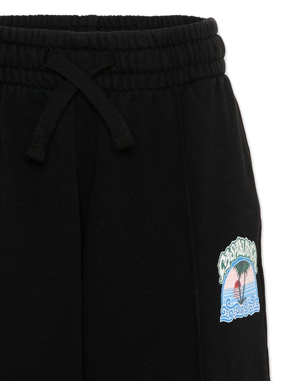 Pantaloni sportivi per bambino Casablanca Kids neri con applicazione laterale KPF26JTR26501 PALM CASABLANCA KIDS 
