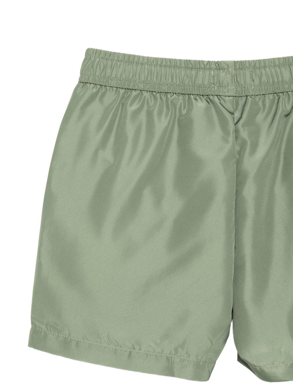 Costume da bagno per bambino Moschino Kids verde con stampa logo HUL01LLKA02 30037 MOSCHINO KIDS 