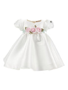 Abito per neonata Monnalisa bianco con dettaglio con fiocco e con fiore 73G903 7302 0120 MONNALISA KIDS 