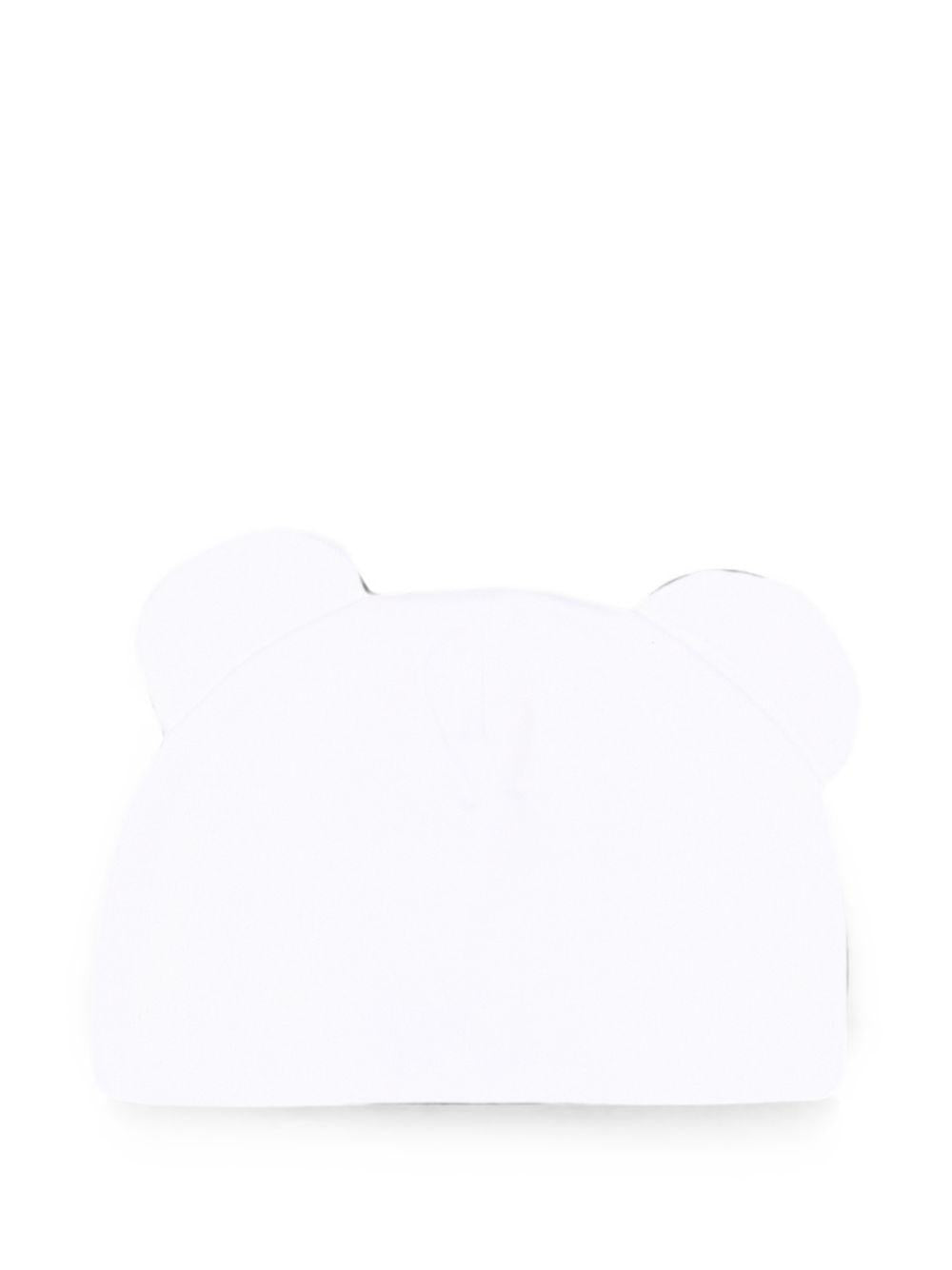 Berretto per neonati Moschino Kids bianco con motivo Teddy bear MMX05HLCA40 10101 MOSCHINO KIDS 