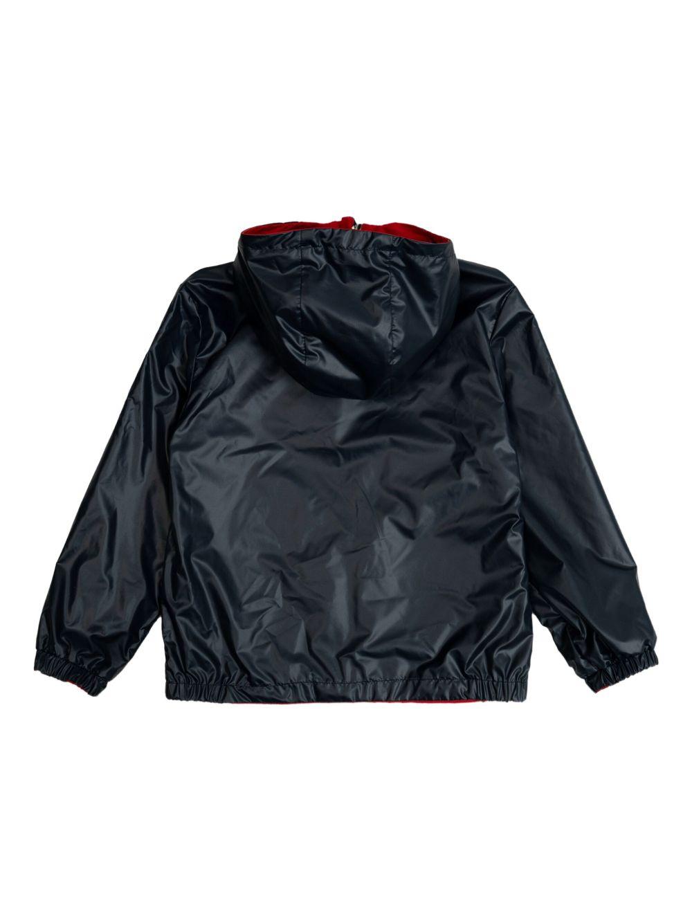 Giubbino per bambino Moncler Enfant rosso reversibile con cappuccio e orli elasticizzati K19541A00114597YW 455 MONCLER ENFANT 