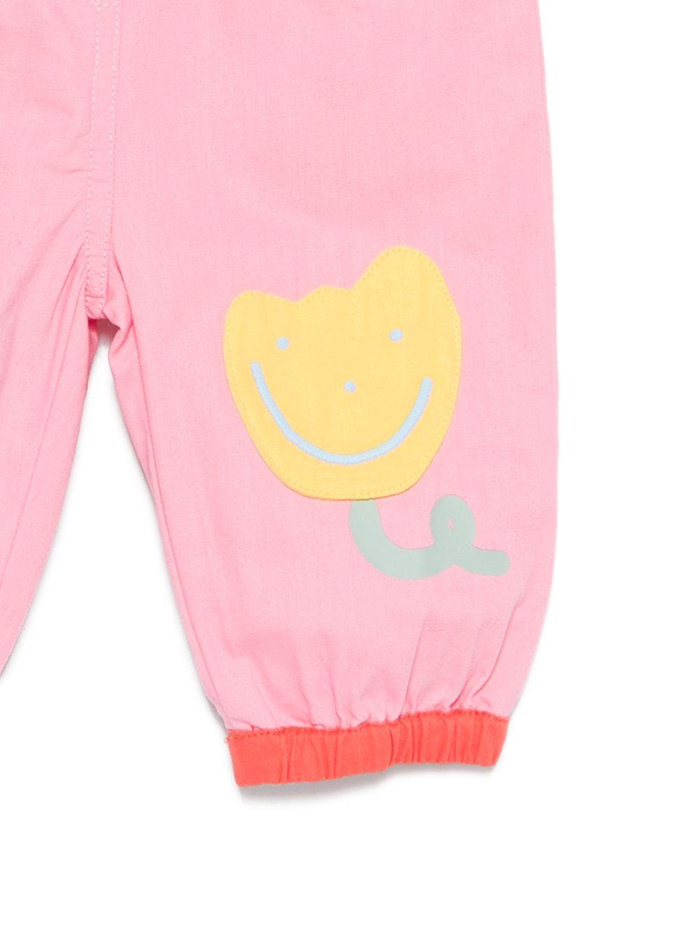 Pantaloni con applicazione per neonata Stella McCartney Kids rosa con fiori TY6110 Z1609 509 STELLA McCARTNEY KIDS 
