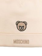Set bavaglino con cappello per neonati Moschino Kids beige con ricamo di orsacchiotto MUY08OLCA60 20404 MOSCHINO KIDS 
