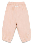 Pantaloni per neonata Donsje Anje rosa con applicazione a fiori 3035801 00108 DONSJE 