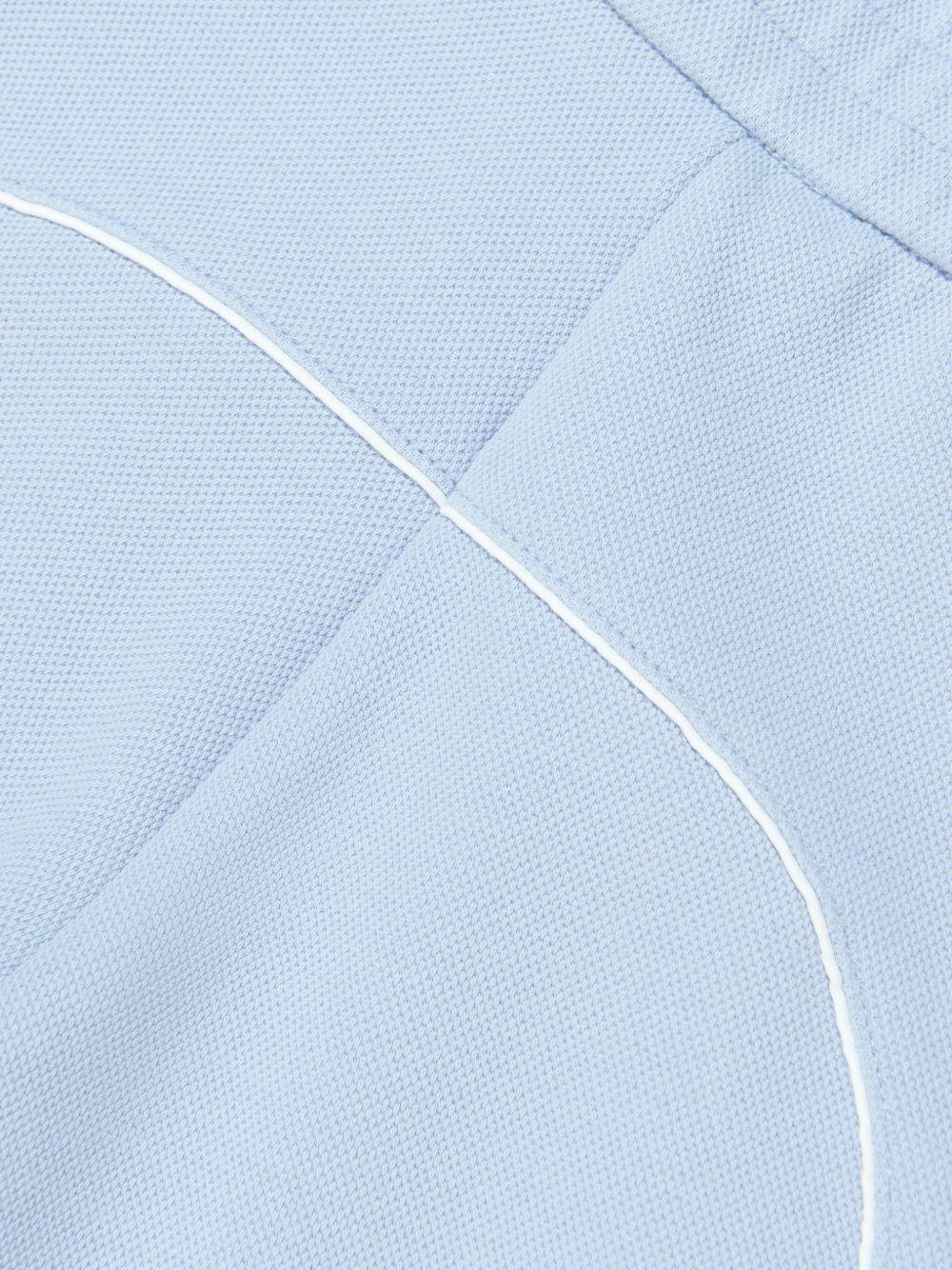 Shorts per bambino Emporio Armani Kids azzurri con logo aquila sul davanti EB001340 AF20638 U9360 EMPORIO ARMANI KIDS 