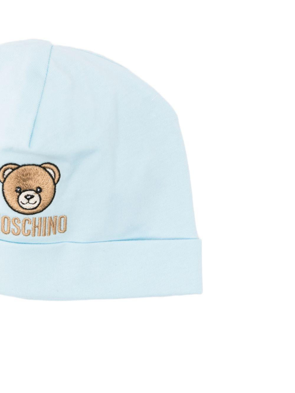 Set cappello e bavaglino per neonato Moschino Kids azzurro con ricamo Teddy Bear MRY03ELAA23 40304 MOSCHINO KIDS 