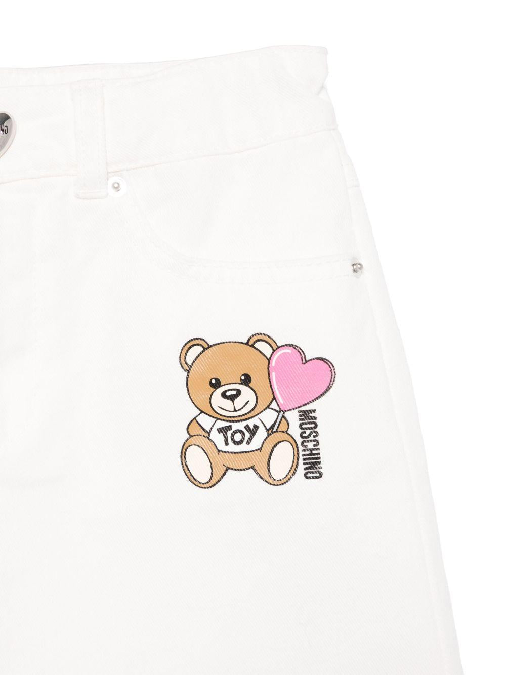 Minigonna denim per bambina Moschino Kids bianco con passanti HAJ03MLOA14 10063 MOSCHINO KIDS 