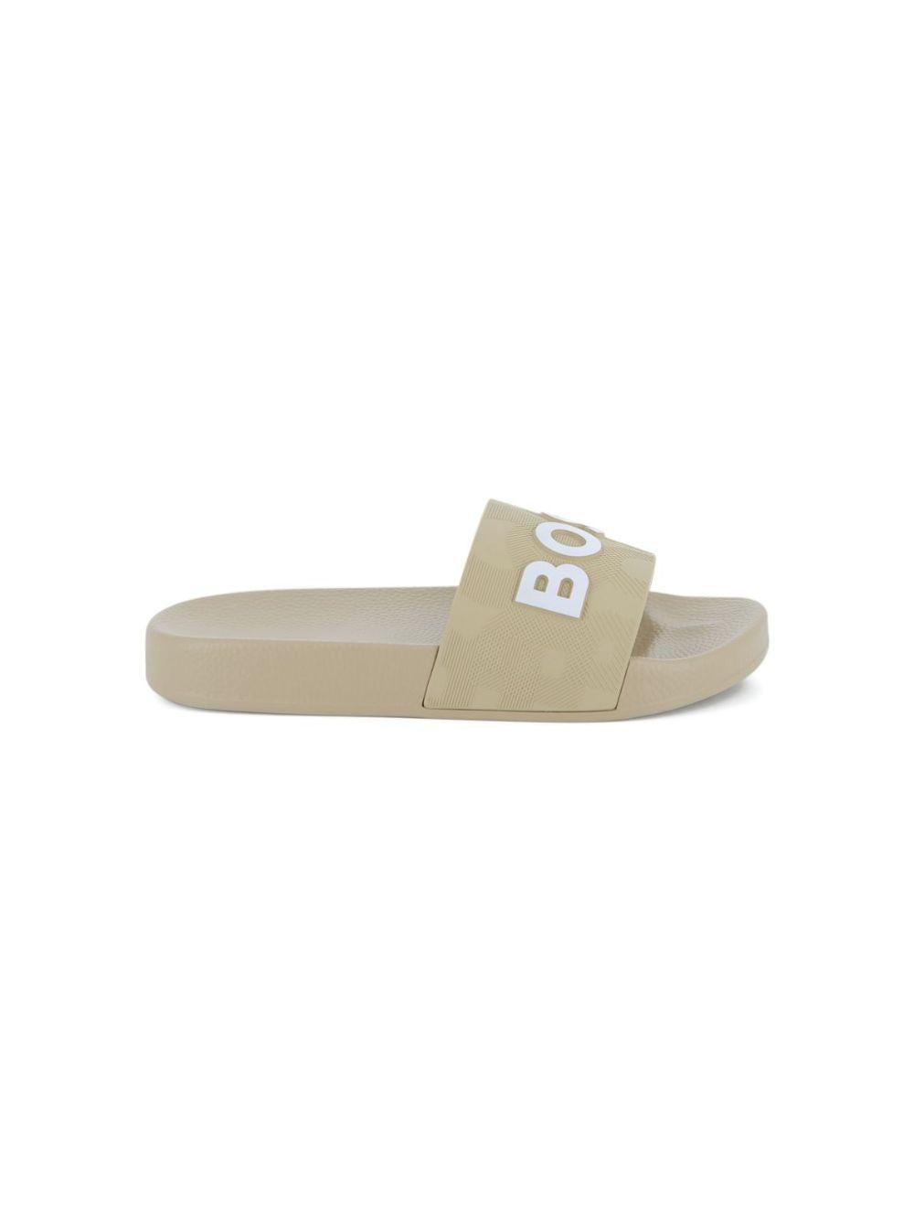 Ciabatte per bambino Boss Kids beige con dettaglio con logo J52799 249 BOSS KIDS 