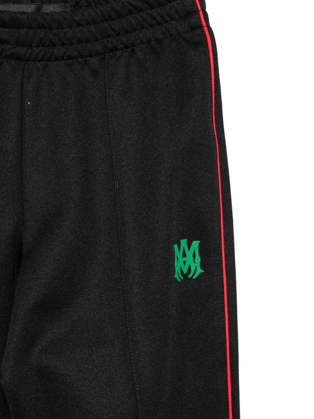 Pantaloni per bambino Amiri Kids neri con righe laterali AKPATP1003 001 AMIRI 