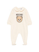 Tutina per neonati Moschino Kids beige con motivo Teddy Bear MUY09OLCA40 20404 MOSCHINO KIDS 