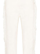 Pantaloni per bambina Stella McCartney Kids bianchi con dettaglio frange sui lati TZ6A50 Z0156 101 STELLA McCARTNEY KIDS 