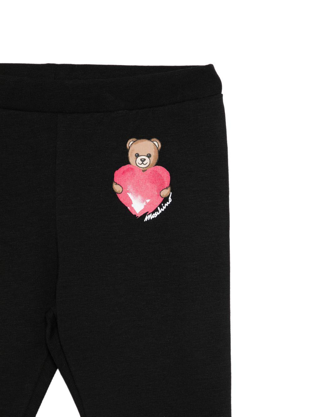 Leggins per neonata Moschino Kids neri con dettaglio Teddy Bear con cuore MIP032LBA00 60100 MOSCHINO KIDS 