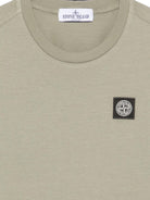 T-shirt per bambino Stone Island Kids verde con applicazione logo sul davanti L2S162100003S0047 V0068 STONE ISLAND KIDS 