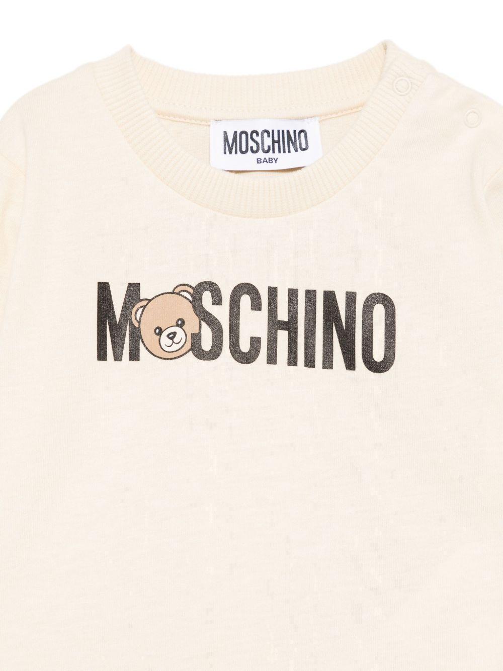 T-shirt per neonati Moschino Kids beige con stampa logo M8O00RLAA36 20404 MOSCHINO KIDS 