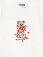 T-shirt per bambina Moschino Kids bianca con stampa grafica HIM06KLBA11 10063 MOSCHINO KIDS 
