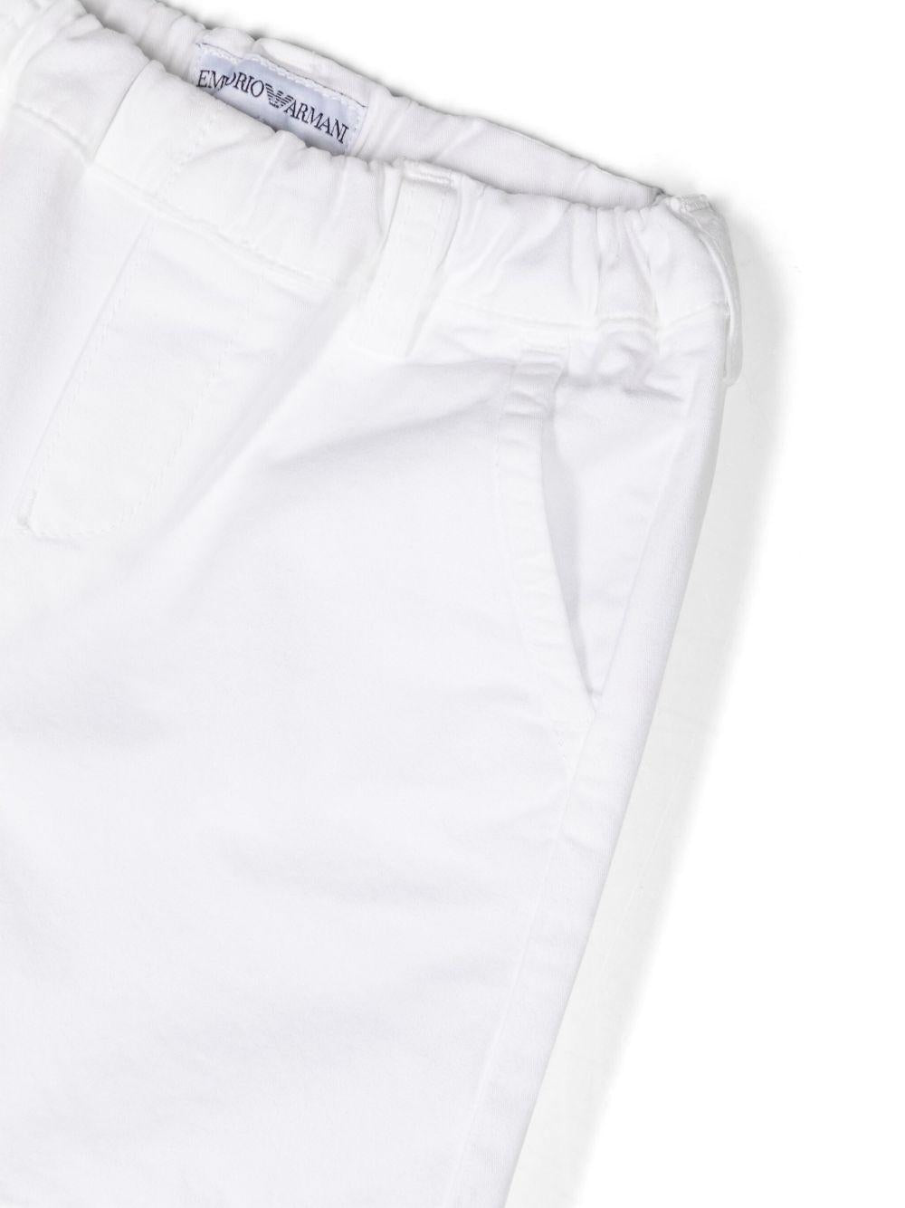 Shorts per neonato Emporio Armani Kids bianchi con placca con logo 8NHS60 4N6YZ 0100 EMPORIO ARMANI KIDS 