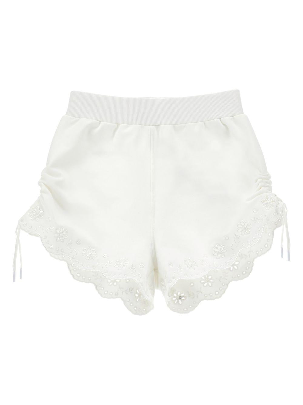 Shorts per bambina Monnalisa bianchi con ricamo a fiori 17G401 7014 0001 MONNALISA KIDS 