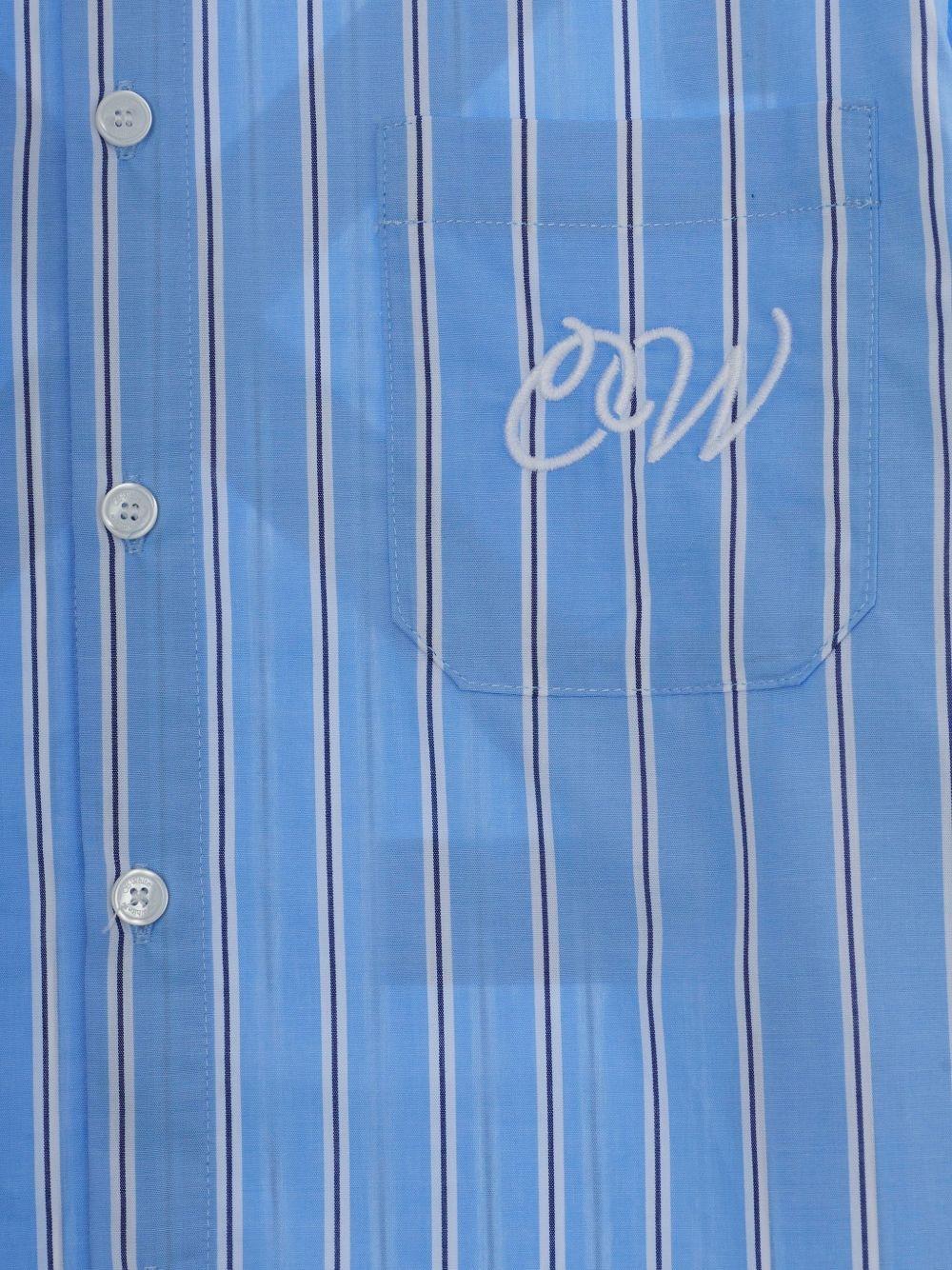 Camicia per bambino Off-White Kids azzurra con stampa grafica sul retro 44BGA00AS26F002 430 OFF WHITE KIDS 