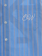 Camicia per bambino Off-White Kids azzurra con stampa grafica sul retro 44BGA00AS26F002 430 OFF WHITE KIDS 
