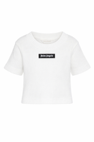 T-shirt per bambina Palm Angels Kids avorio con dettaglio logo PGAA017S26JER001 002 PALM ANGELS KIDS 