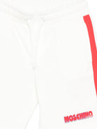 Completo per bambino Moschino Kids bianco con dettagli a contrasto HUG00XLAA51 10063 MOSCHINO KIDS 