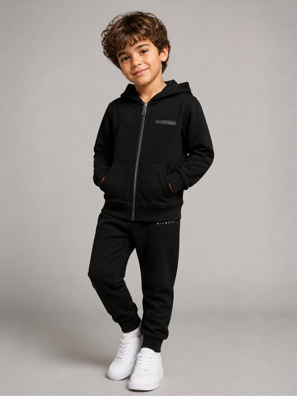 Tuta per bambino John Richmond Junior nera con cappuccio e logo RBA26018CF BLACK JOHN RICHMOND KIDS 