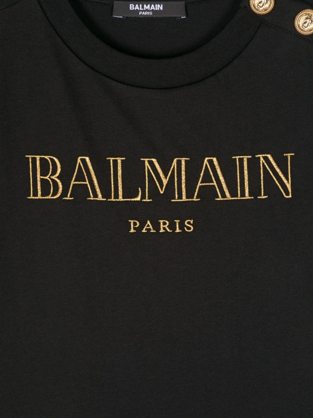 T-shirt con logo glitter per bambina Balmain Kids nero con bottoni oro BV8B91 Z0082 930OR BALMAIN KIDS 